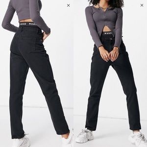 Black jean, size US2, 70% Cotton, 30% Polyester. Soft and comfortable.